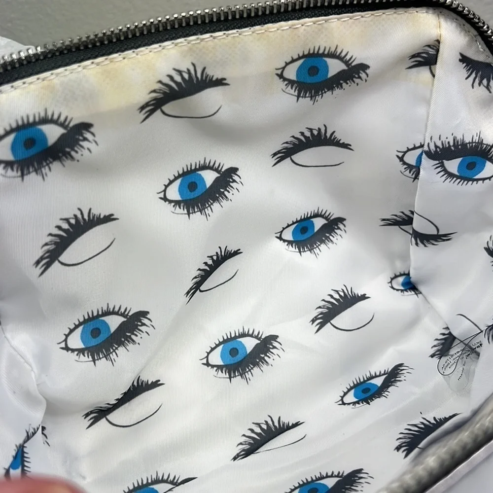 NWT Rodan + Fields Cosmetic Bag Silver with Tassel